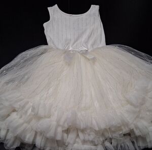 Dramatic White Tulle Dress With Satin Bow